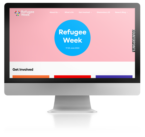 Desktop computer with the Refugee Week Website open in the browser